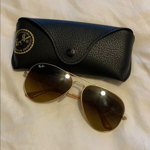 Gold rayban aviators
